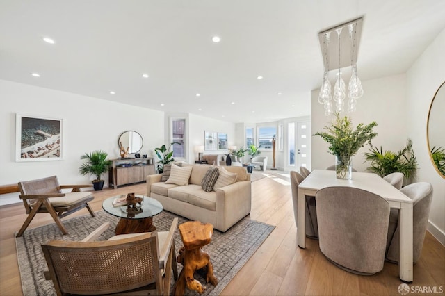 living room with light hardwood / wood-style floors