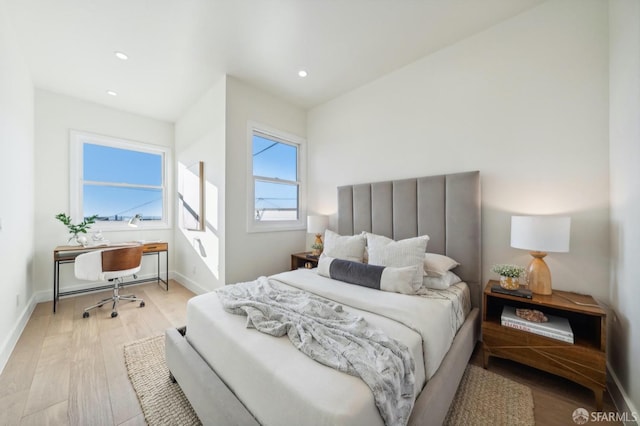 bedroom featuring light wood-type flooring