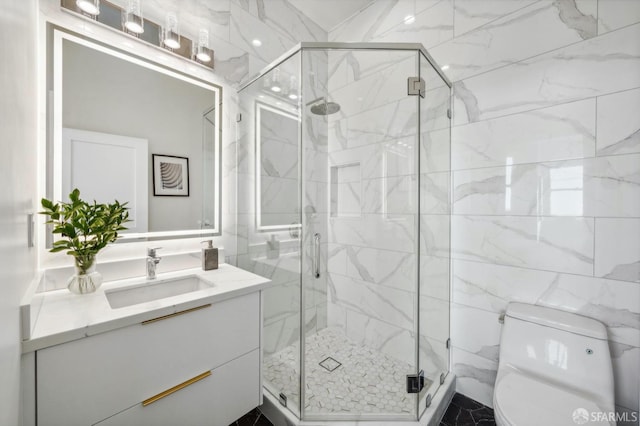 bathroom with walk in shower, vanity, and toilet