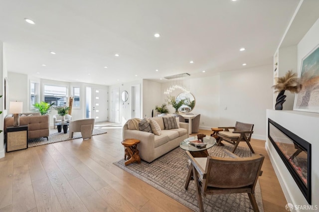 living room with light hardwood / wood-style floors