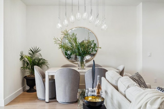 dining area featuring hardwood / wood-style floors