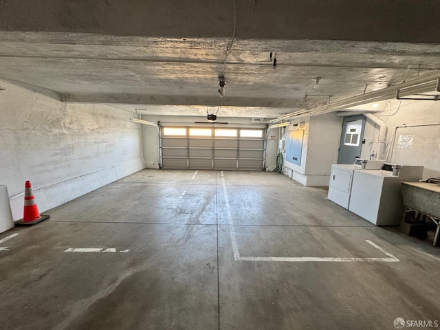1646 19th Ave, San Francisco, CA 94122 - garage featuring washer and clothes dryer and a garage door opener