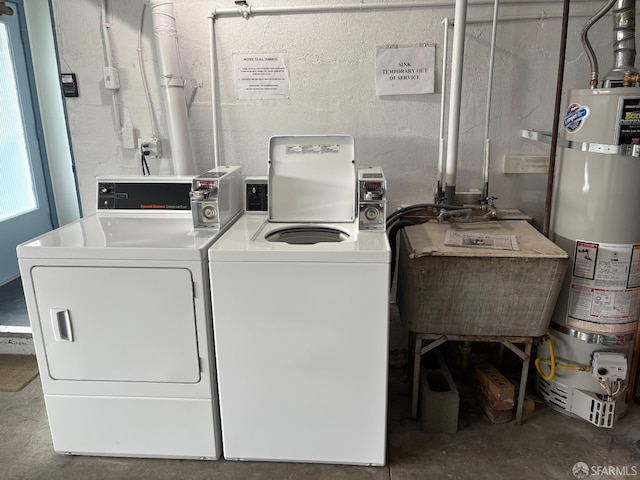 1646 19th Ave, San Francisco, CA 94122 - laundry area featuring washer and clothes dryer and secured water heater