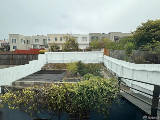 1646 19th Ave, San Francisco, CA 94122 - fenced backyard with a residential view