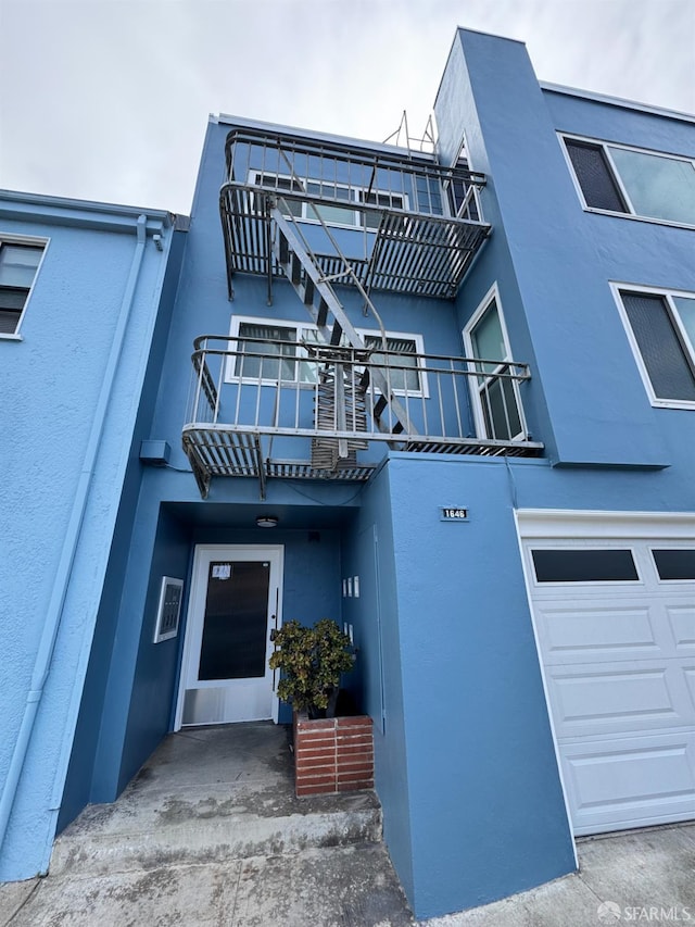 1646 19th Ave, San Francisco, CA 94122 - view of building exterior featuring an attached garage