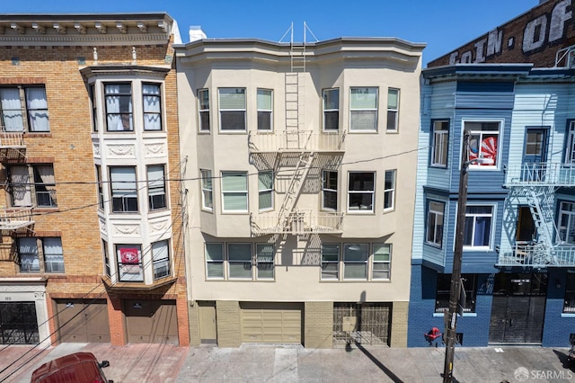 173 Julian Ave, San Francisco, CA 94103 - view of building exterior with an attached garage
