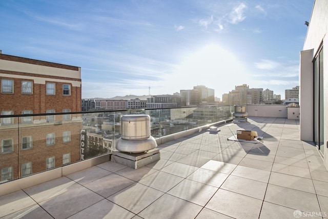 view of patio featuring a balcony