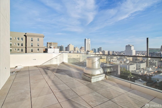 view of patio featuring a balcony