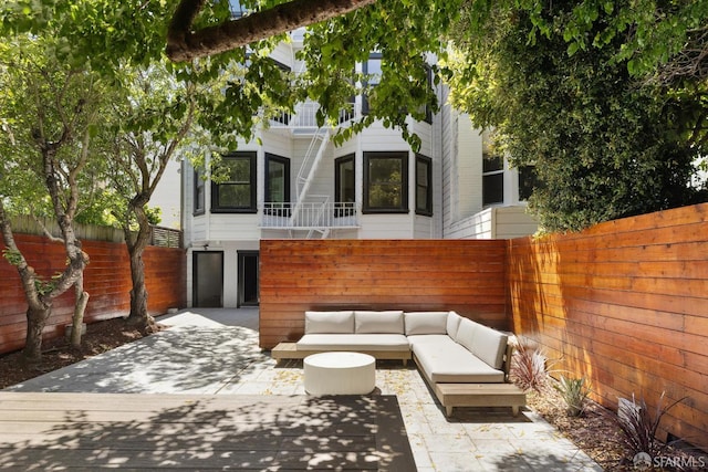 1234 Francisco St Unit 6, San Francisco, CA 94123 - fenced backyard with an outdoor living space and a patio area