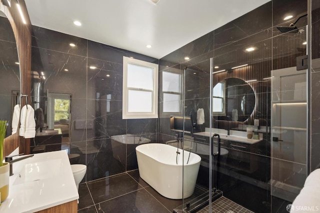 1234 Francisco St Unit 6, San Francisco, CA 94123 - bathroom featuring tile walls, a shower stall, vanity, and a freestanding bath