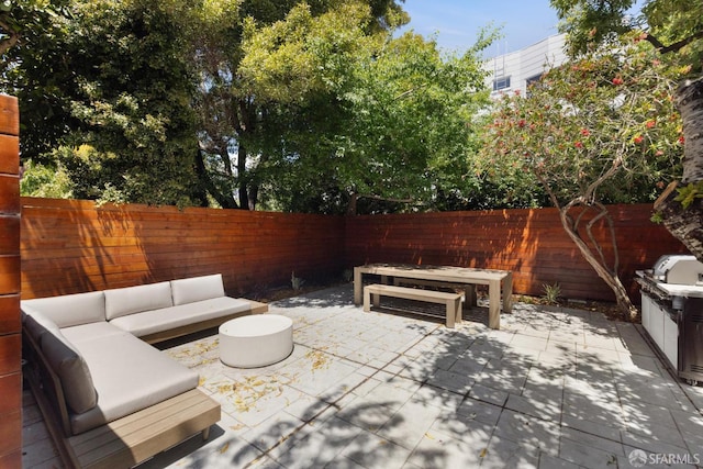 1234 Francisco St Unit 6, San Francisco, CA 94123 - fenced backyard with an outdoor hangout area and a patio