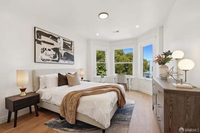 1234 Francisco St Unit 6, San Francisco, CA 94123 - bedroom with light wood-style flooring and recessed lighting