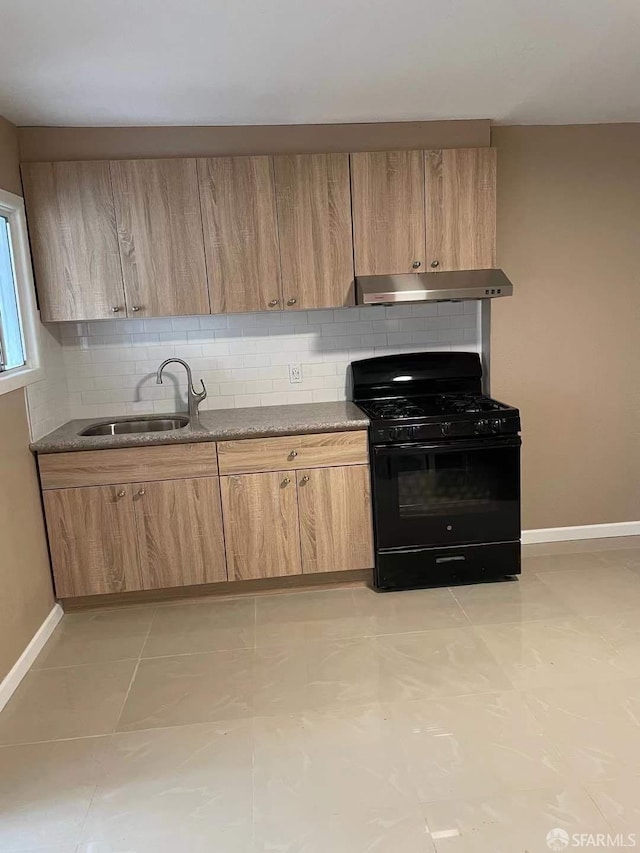 kitchen with tasteful backsplash, sink, light tile patterned flooring, black gas stove, and ventilation hood