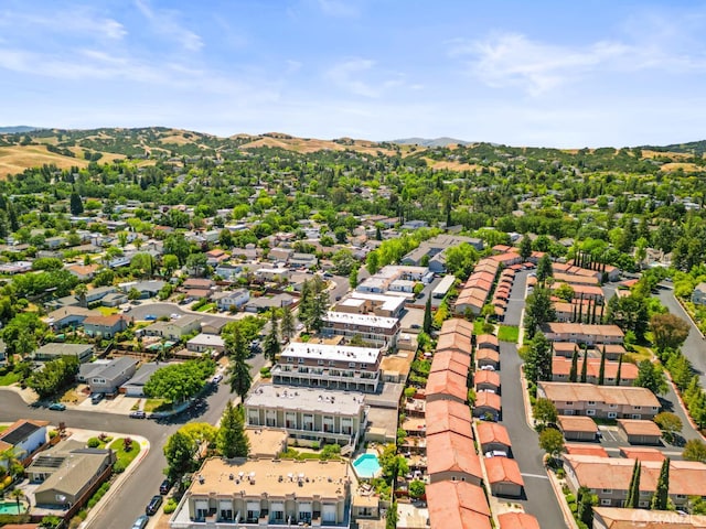 aerial view of residential area with mountains