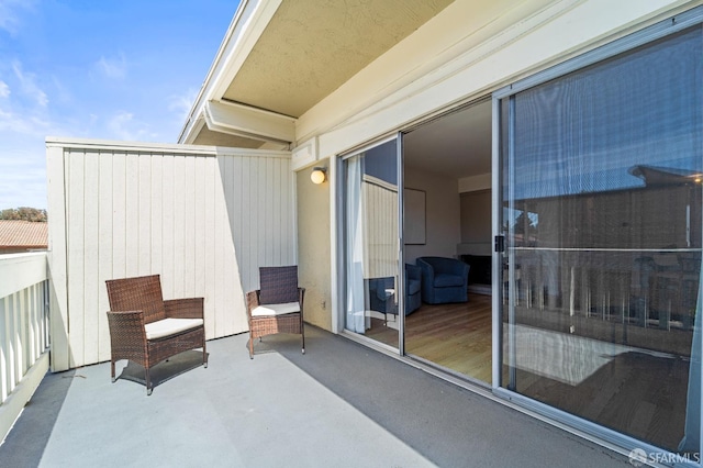 view of patio with a balcony