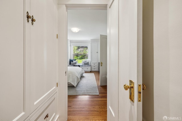 hallway featuring wood finished floors