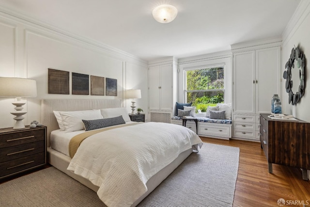 bedroom with light wood-type flooring