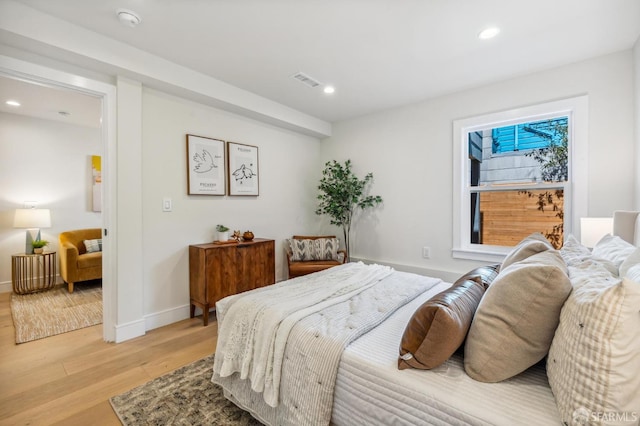 bedroom featuring light wood-type flooring