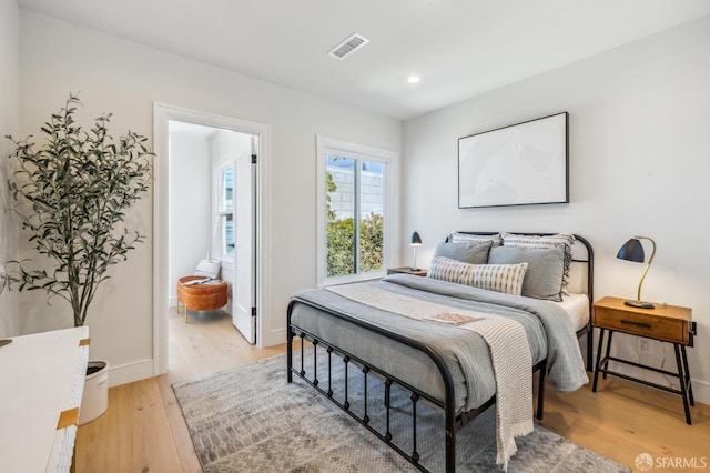 bedroom featuring wood-type flooring