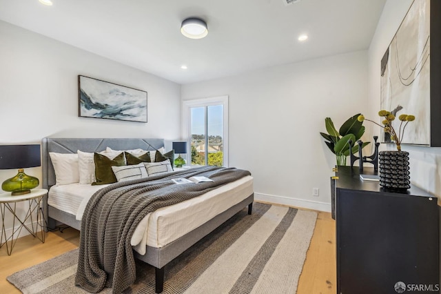 bedroom featuring light wood-type flooring