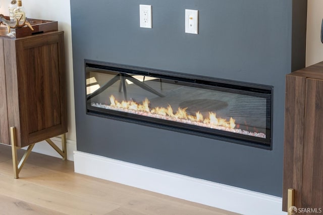 interior details with hardwood / wood-style flooring