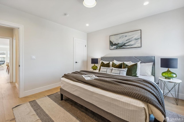 bedroom featuring light hardwood / wood-style flooring