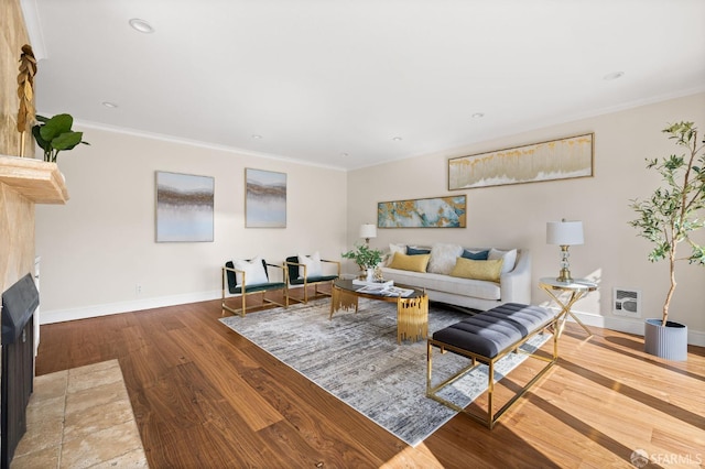 3044 Franklin St Unit 302, San Francisco, CA 94123 - living area with a fireplace with flush hearth, wood finished floors, baseboards, crown molding, and recessed lighting
