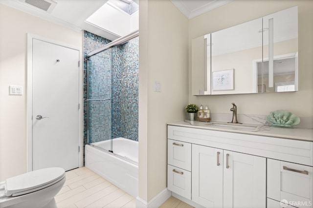 3044 Franklin St Unit 302, San Francisco, CA 94123 - bathroom featuring toilet, ornamental molding, vanity, and shower / bath combination with glass door