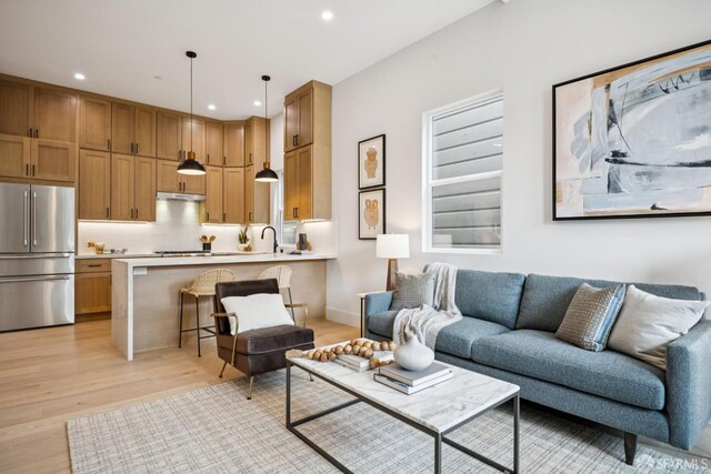 102 Baker St Unit B, San Francisco, CA 94117 - living area with light wood-type flooring and recessed lighting