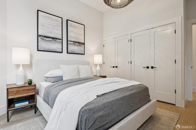 102 Baker St Unit B, San Francisco, CA 94117 - bedroom with light wood finished floors and multiple closets