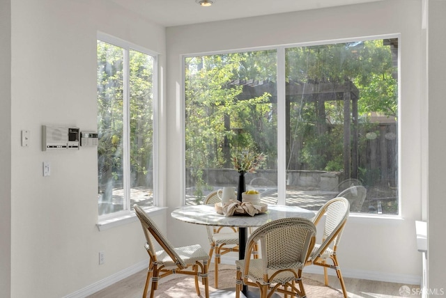 sunroom with plenty of natural light