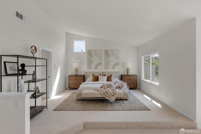 bedroom with carpet flooring, high vaulted ceiling, and visible vents