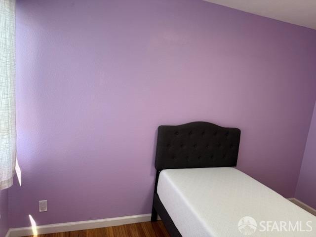 397 Imperial Way Unit 306, Daly City, CA 94015 - bedroom featuring baseboards and wood finished floors