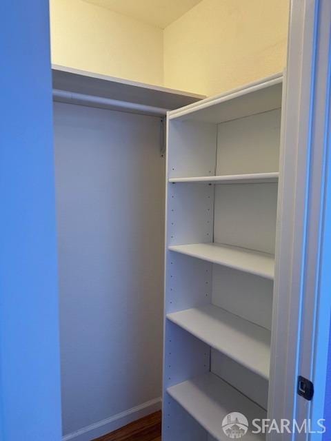 397 Imperial Way Unit 306, Daly City, CA 94015 - walk in closet with dark wood-type flooring