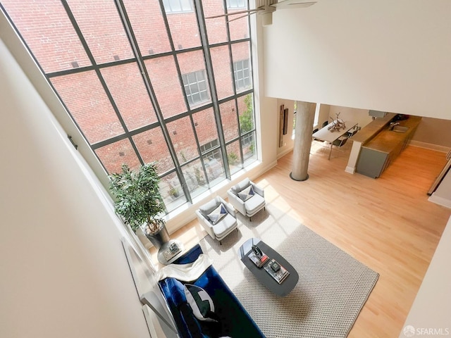 1 Bluxome St Unit 317, San Francisco, CA 94107 - living area with a high ceiling and wood finished floors