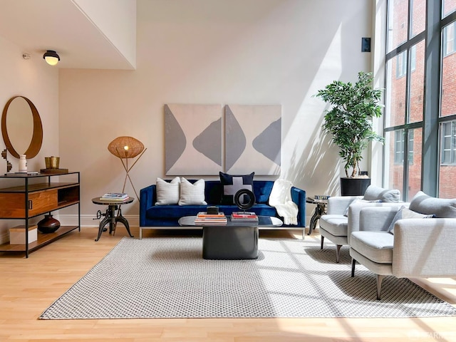 1 Bluxome St Unit 317, San Francisco, CA 94107 - living area with wood finished floors and healthy amount of natural light