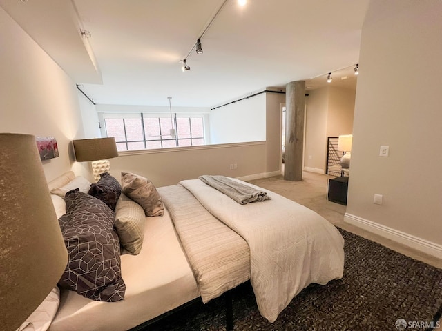 1 Bluxome St Unit 317, San Francisco, CA 94107 - carpeted bedroom with track lighting and baseboards