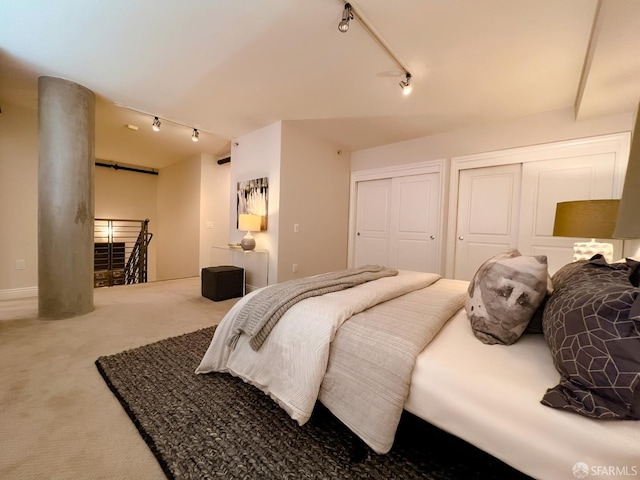 1 Bluxome St Unit 317, San Francisco, CA 94107 - carpeted bedroom with track lighting and multiple closets