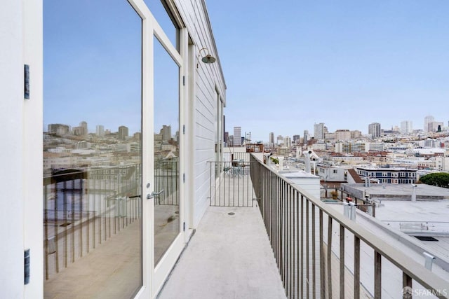 balcony featuring a city view