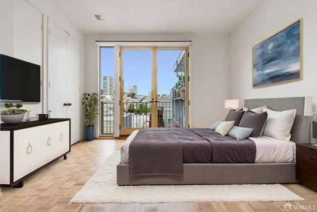 bedroom with access to outside and french doors