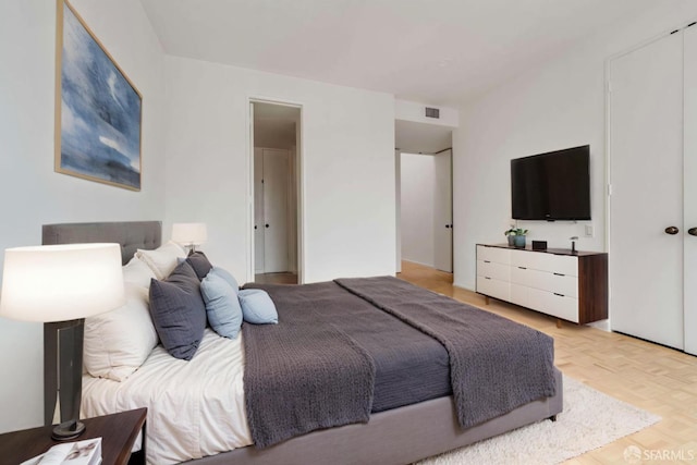 bedroom with visible vents