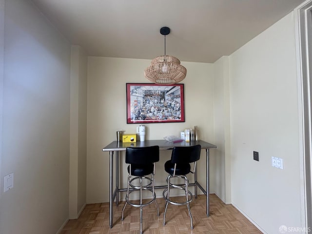 dining room featuring baseboards