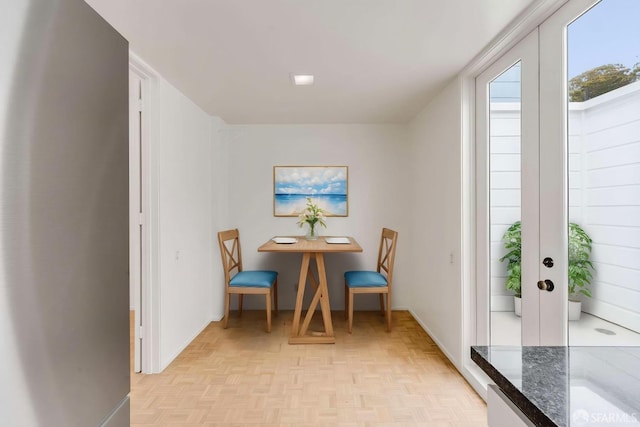 dining space with baseboards