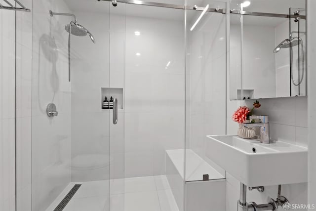 bathroom featuring sink and walk in shower