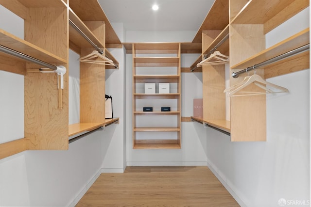 walk in closet featuring light wood-type flooring