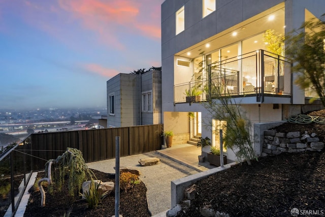 view of property exterior at dusk