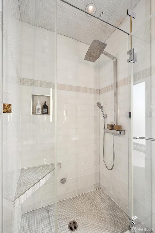 full bathroom with a shower stall