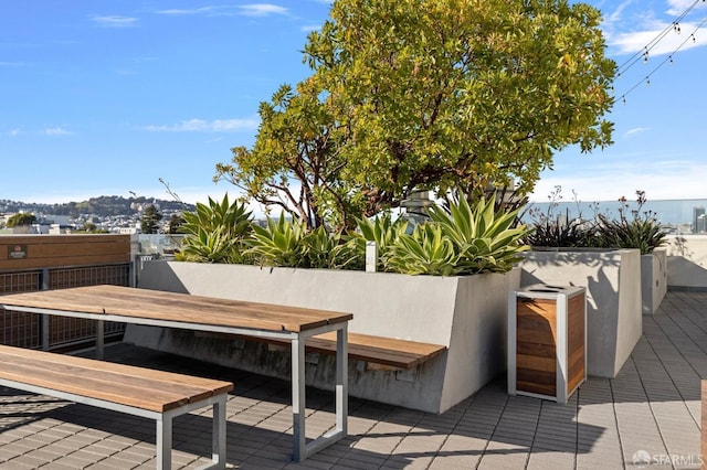 deck featuring a water view