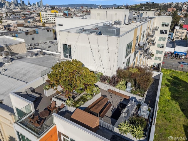 birds eye view of property featuring a view of city