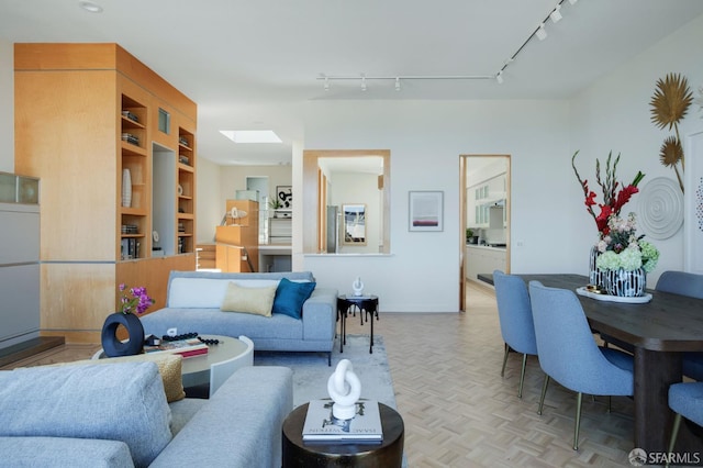 773 Duncan St, San Francisco, CA 94131 - living room with track lighting, a skylight, and baseboards